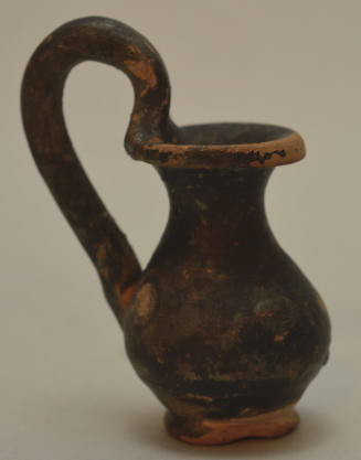 Miniature black glazed olpe with high handle