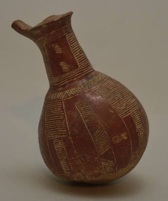 Cypriot redware jug with incised ornament
