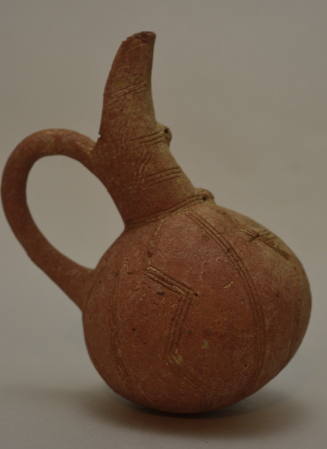 Cypriot redware juglet with incised geometric ornament