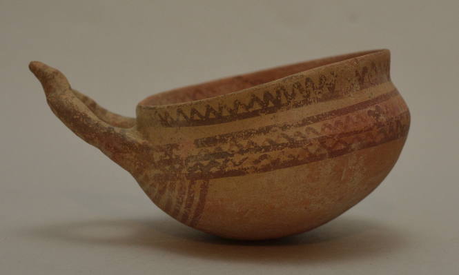Cypriot hemispherical cup with lateral handle and red painted linear ornament