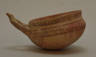 Cypriot hemispherical cup with lateral handle and red painted linear ornament