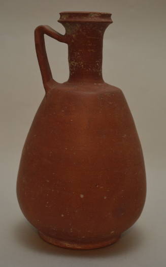 Roman red-slip pottery jug with tapering and angular strap handle