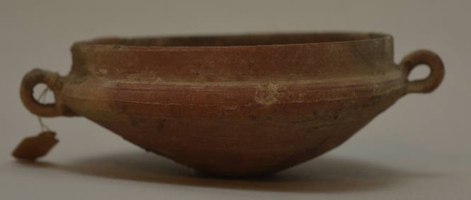 Unglazed kylix with ring handles and straight lip