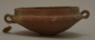 Unglazed kylix with ring handles and straight lip