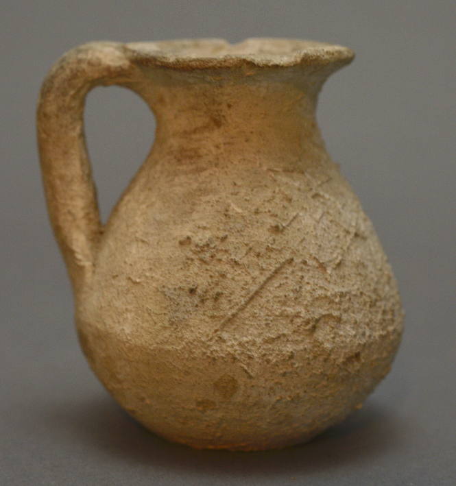 Small jug with ovoid body and wide mouth