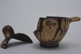 Attic skyphos with one vertical and one horizontal handle painted with owls and foliage