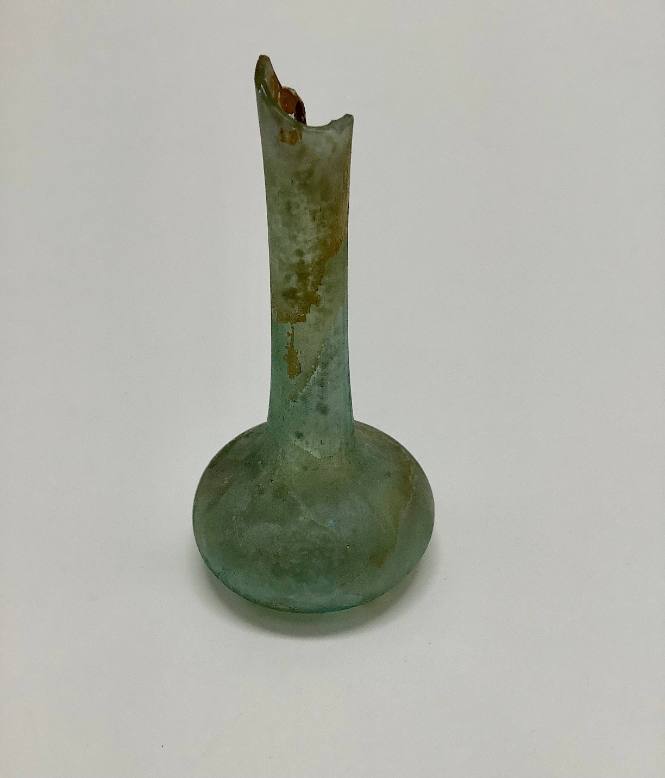 Tall-necked flask or unguentarium slightly concave base, rim broken