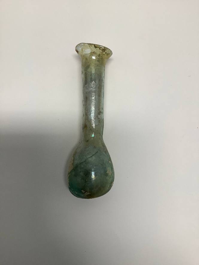 Unguentarium with bulbous body straight neck and everted rim