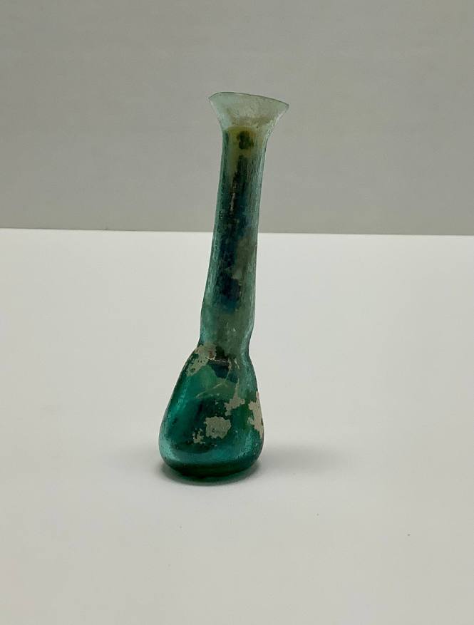 Roman unguentarium with constriction between body and neck; flattened rim
