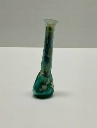 Roman unguentarium with constriction between body and neck; flattened rim