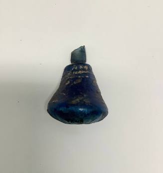 Mold-pressed (?) vessel with teardrop pattern at base
