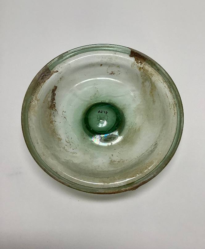 Shallow bowl with folded rim and ring foot
