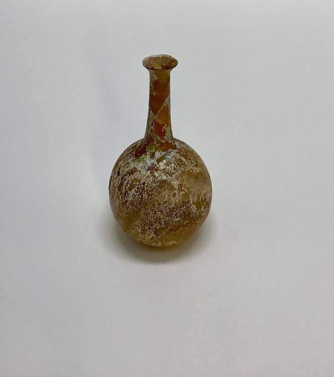Roman bottle with ovoid body tapering to slender neck