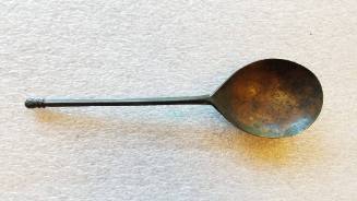Spoon with small knob at end of handle