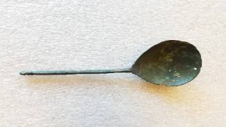 Spoon with wide bowl and narrow handle terminating in a small knob