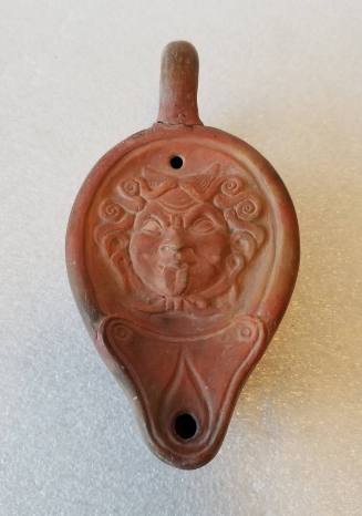 Lamp with relief of Medusa's head