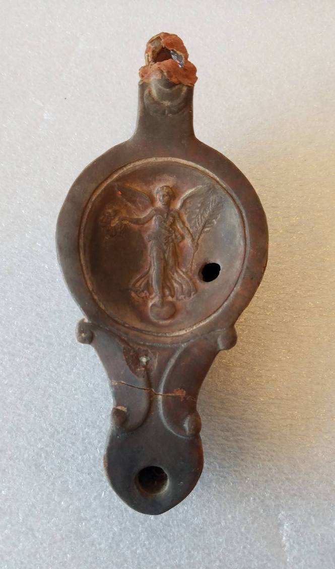 Lamp with relief of winged victory