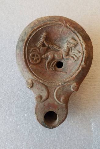 Lamp with relief of charioteer