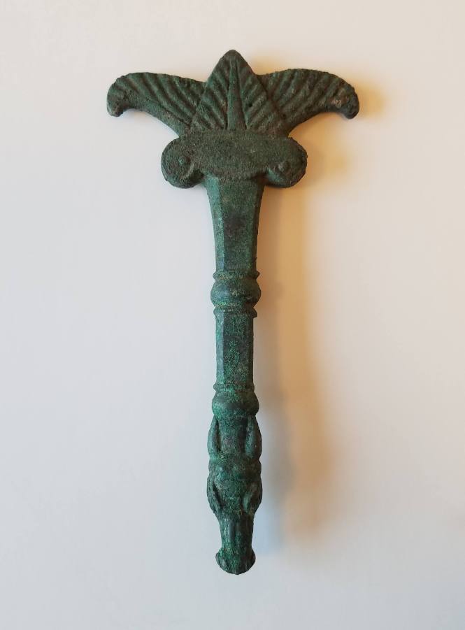 Handle for mirror; terminating in a horse's head; engraved circles on back of reflecting surface of mirror