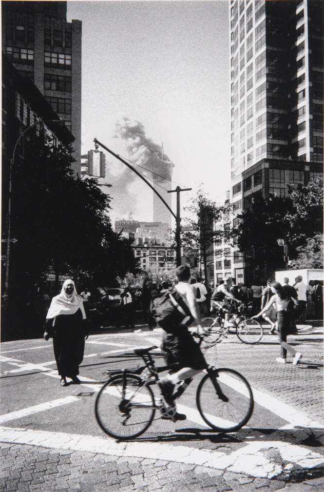 [North Tower burning, from Broome Street]