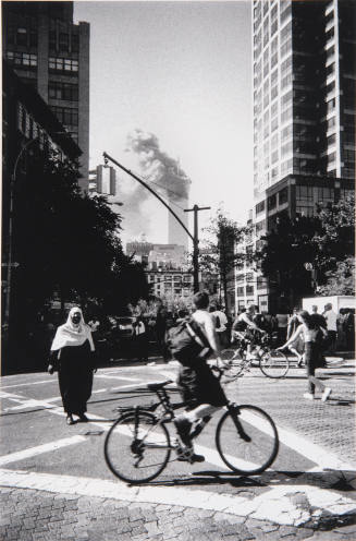 [North Tower burning, from Broome Street]