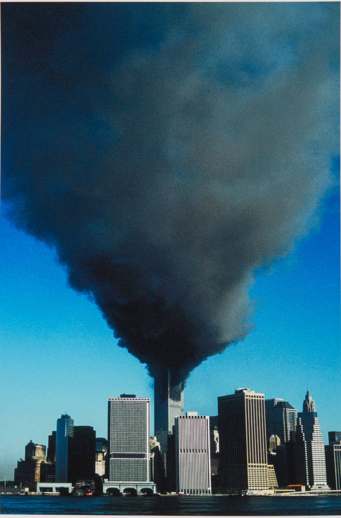 [Plume of smoke over south tower]