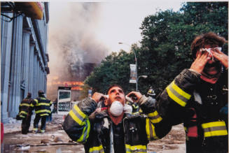 [Firemen wipe their eyes]