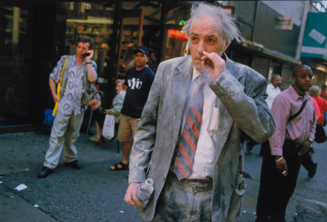 [Ash-covered man with cigarette]