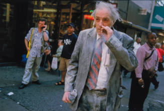 [Ash-covered man with cigarette]