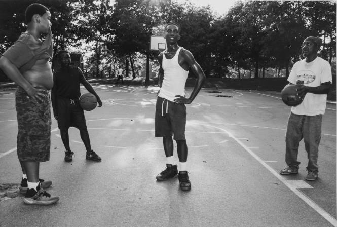 Ice playing basketball with children. Market Street. Poughkeepsie, NY.