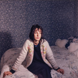 Untitled [woman on a bed]