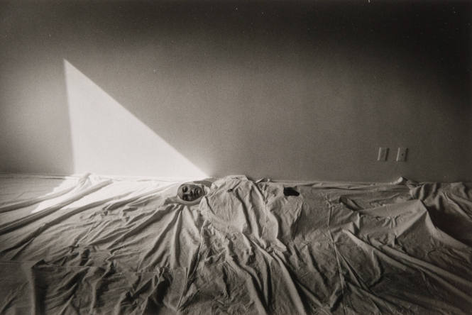 Untitled [figure under sheets] 