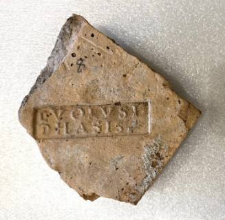 Fragment with latin inscription on crescent-shaped ground