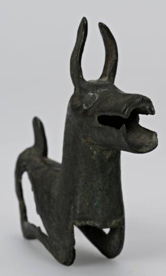 Yoke ornament of a crouching, open-mouthed